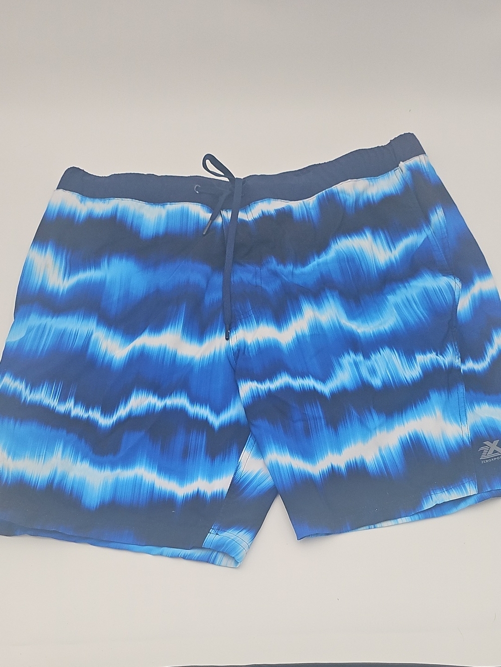 ZeroXposur Men's Blue Wave-Pattern Swim Trunks